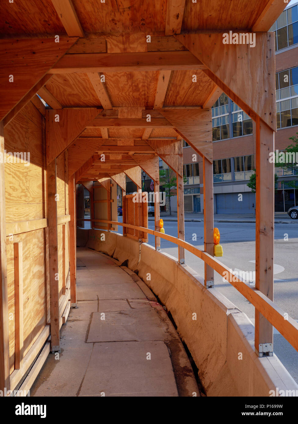 Covered walkway past construction site. Milwaukee, Wisconsin Stock