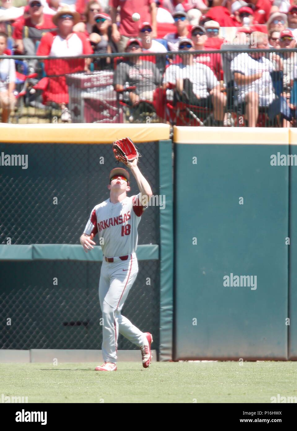 Jun 2, 2018: Arkansas left fielder Heston Kjerstad #18 moves over under a  fly ball hit towards him. Arkansas defeated Southern Miss 10-2 in the NCAA  Fayetteville Baseball Regional at Baum Stadium