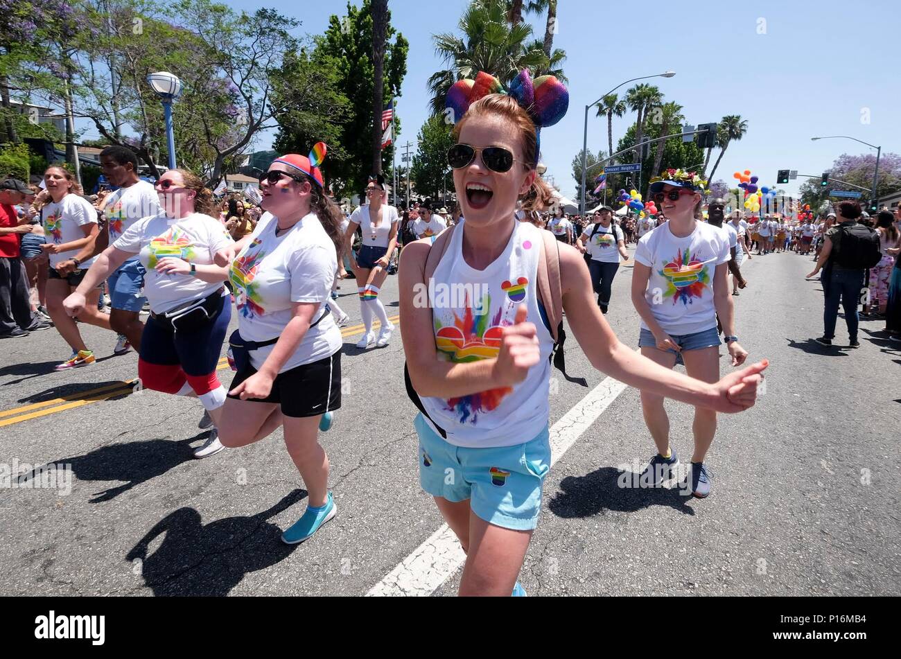 Los Angeles, USA. 10th June, 2018. Parade participants march along