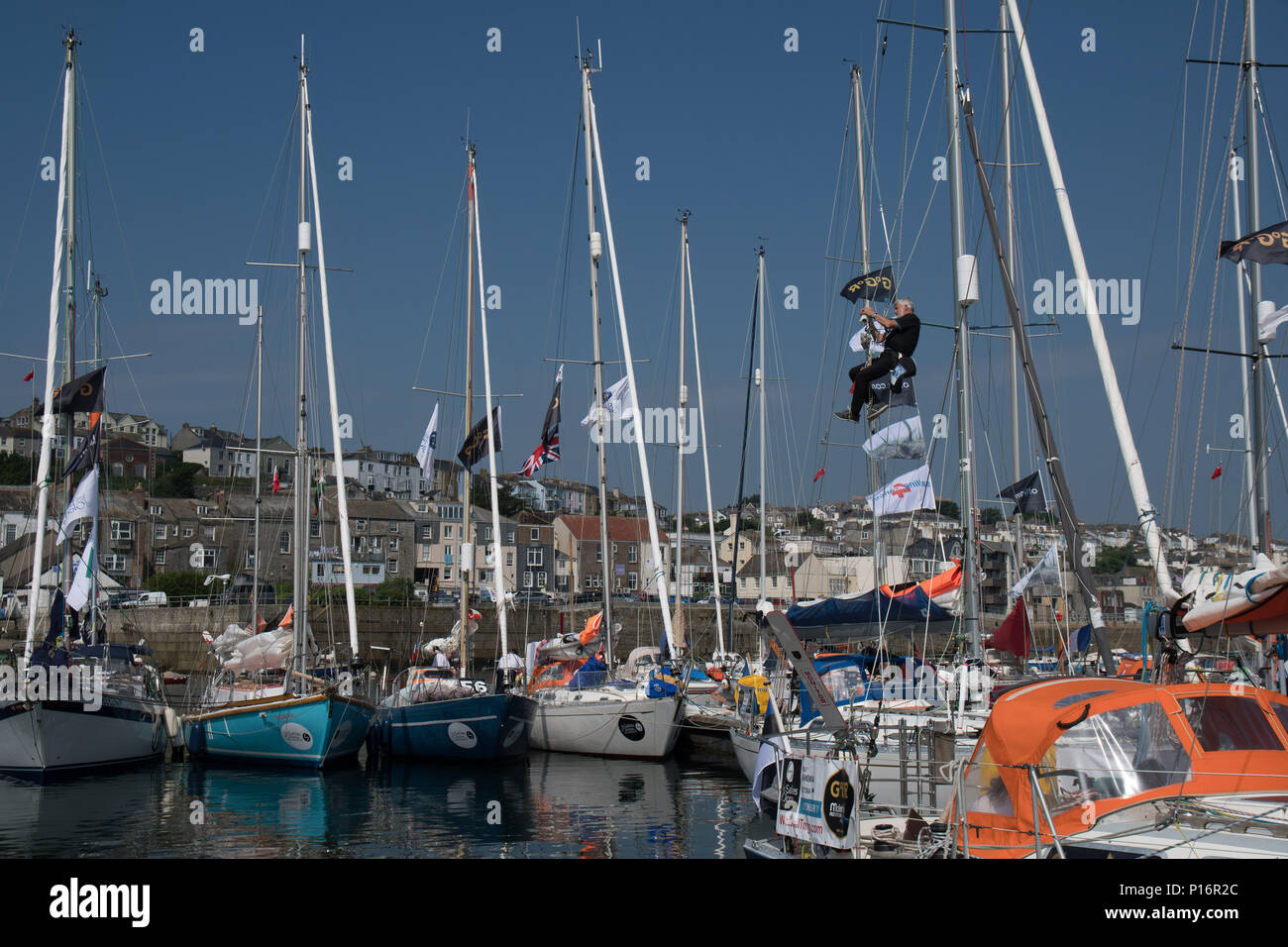 Falmouth, Cornwall, UK. 11th June 2018. Preparations are underway on boats moored at Falmouth, as part of the Start of the SITRaN Charity Race from Pendennis Point to Les Sables d’Olonne, the first stage of the 50th anniversary Golden Globe Race which will commence from the French port on Sunday July 1st. Credit: Simon Maycock/Alamy Live News Stock Photo