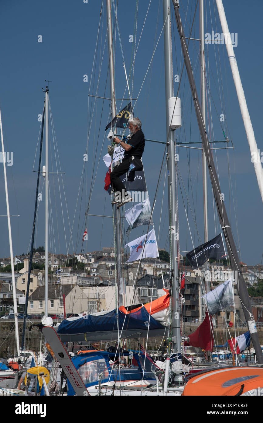 Falmouth, Cornwall, UK. 11th June 2018. Preparations are underway on boats moored at Falmouth, as part of the Start of the SITRaN Charity Race from Pendennis Point to Les Sables d’Olonne, the first stage of the 50th anniversary Golden Globe Race which will commence from the French port on Sunday July 1st. Credit: Simon Maycock/Alamy Live News Stock Photo