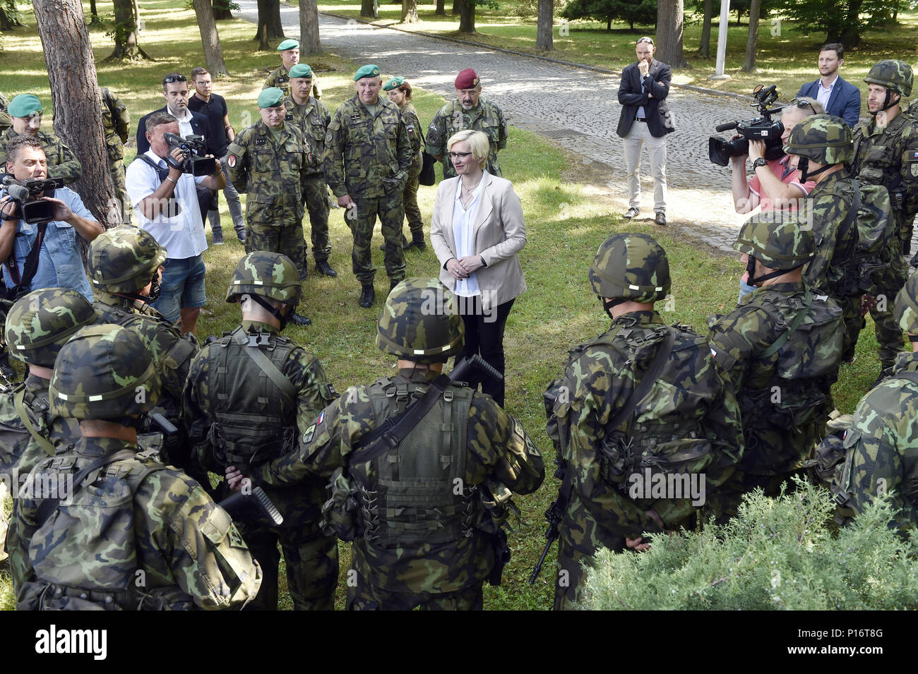 Hranice, Czech Republic. 11th June, 2018. Czech Defence Minister Karla Slechtova (centre), Chief-of-Staff Ales Opata, Canadian Ambassador Barbara Richardson and Latvian Ambassador Alberts Sarkanis attend military event of seventh mechanised brigade before departures of soldiers on mission to Baltics in Hranice near Prerov, Czech Republic, June 11, 2018. Credit: Ludek Perina/CTK Photo/Alamy Live News Stock Photo