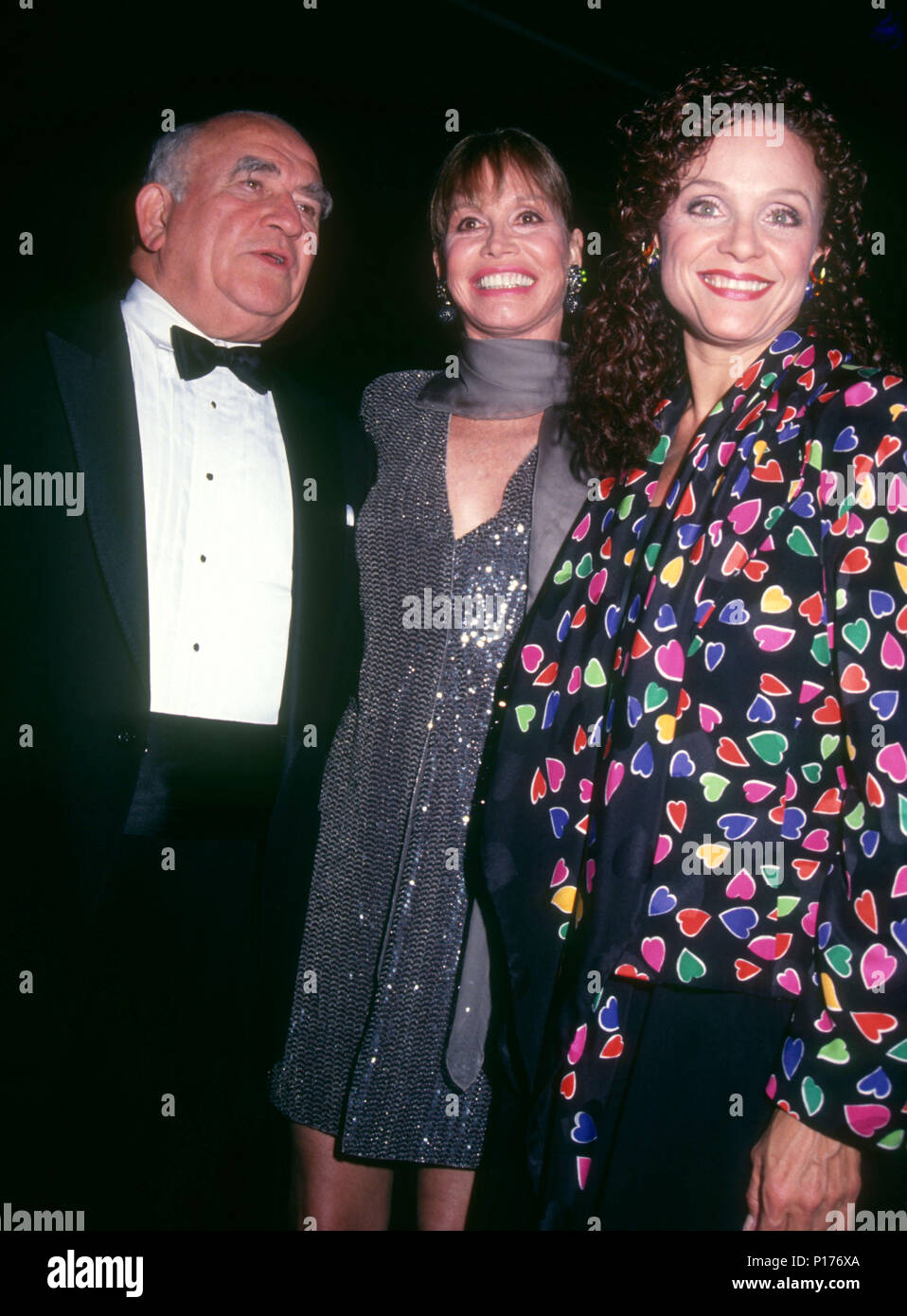 BEVERLY HILLS, CA - OCTOBER 04: (L-R) Actor Ed Asner, actress/honoree Mary Tyler Moore and actress Valerie Harper attend the Los Angeles Chapter Juvenile Diabetes Research Foundation International Presents the First Annual Promise Ball on October 4, 1991 at the Beverly Hilton Hotel in Beverly Hills, California. Photo by Barry King/Alamy Stock Photo Stock Photo