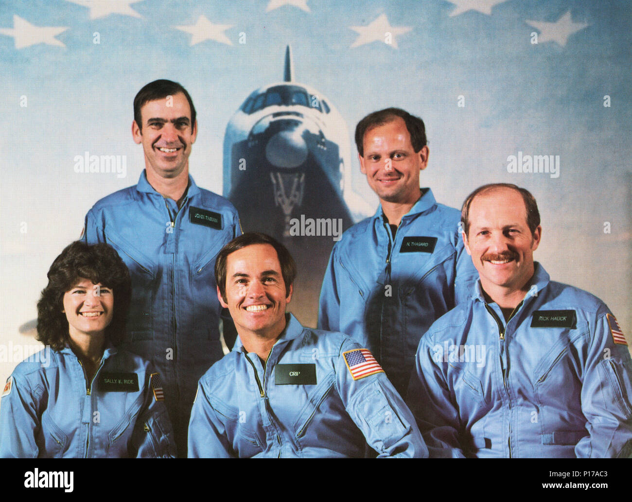 Astronauts of the STS-7/Challenger mission are left to right first row: Sally K. Ride (mission specialist), Robert L. Crippen (commander), Frederick H. Hauck (pilot); rear row: John M. Fabian (left) and Norman E. Thagard (mission specialists). STS-7 launched the first five-member crew and the first American female astronaut into space on June 18, 1983. Stock Photo