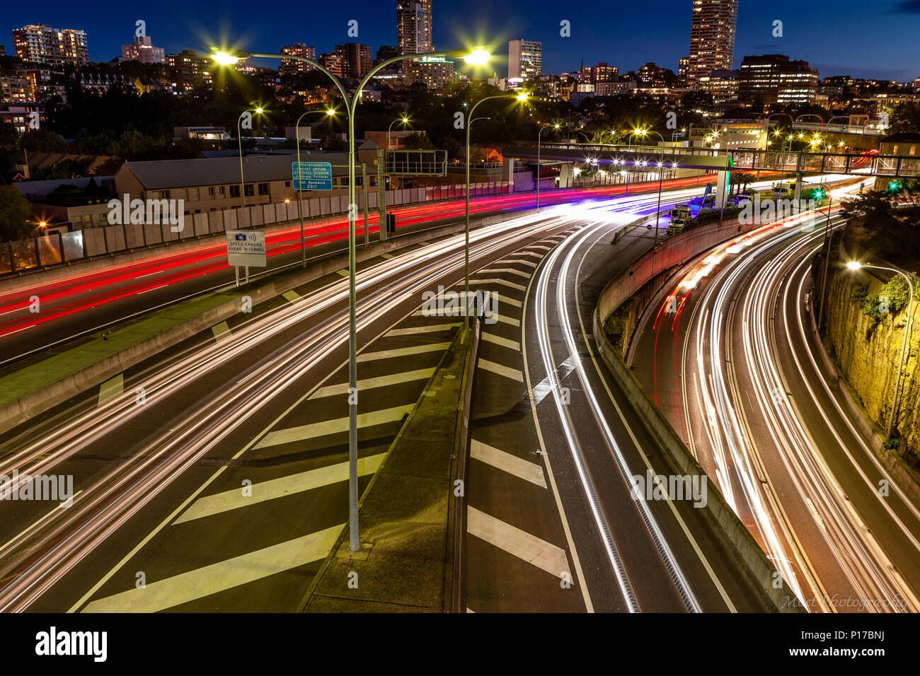 Light Trails in the City as Commuters Head Home Stock Photo