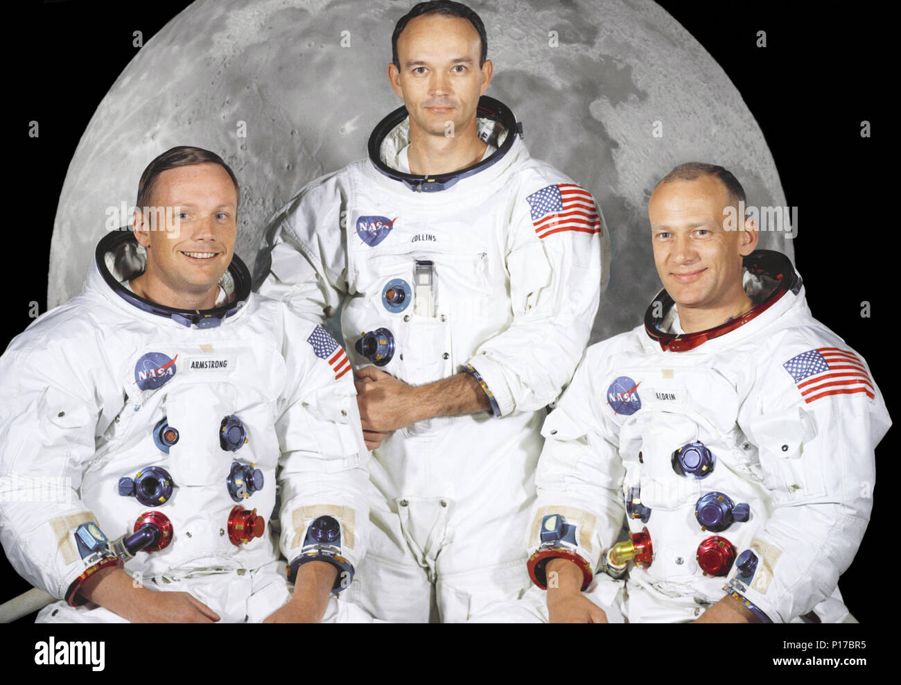 Portrait of the prime crew of the Apollo 11 lunar landing mission. From left to right they are: Commander, Neil A. Armstrong, Command Module Pilot, Michael Collins, and Lunar Module Pilot, Edwin E. Aldrin Jr. On July 20th 1969 at 4:18 PM, EDT the Lunar Module 'Eagle' landed in a region of the Moon called the Mare Tranquillitatis, also known as the Sea of Tranquillity. After securing his spacecraft, Armstrong radioed back to earth: 'Houston, Tranquility Base here, the Eagle has landed'. At 10:56 p.m. that same evening and witnessed by a worldwide television audience, Neil Armstrong stepped off  Stock Photo