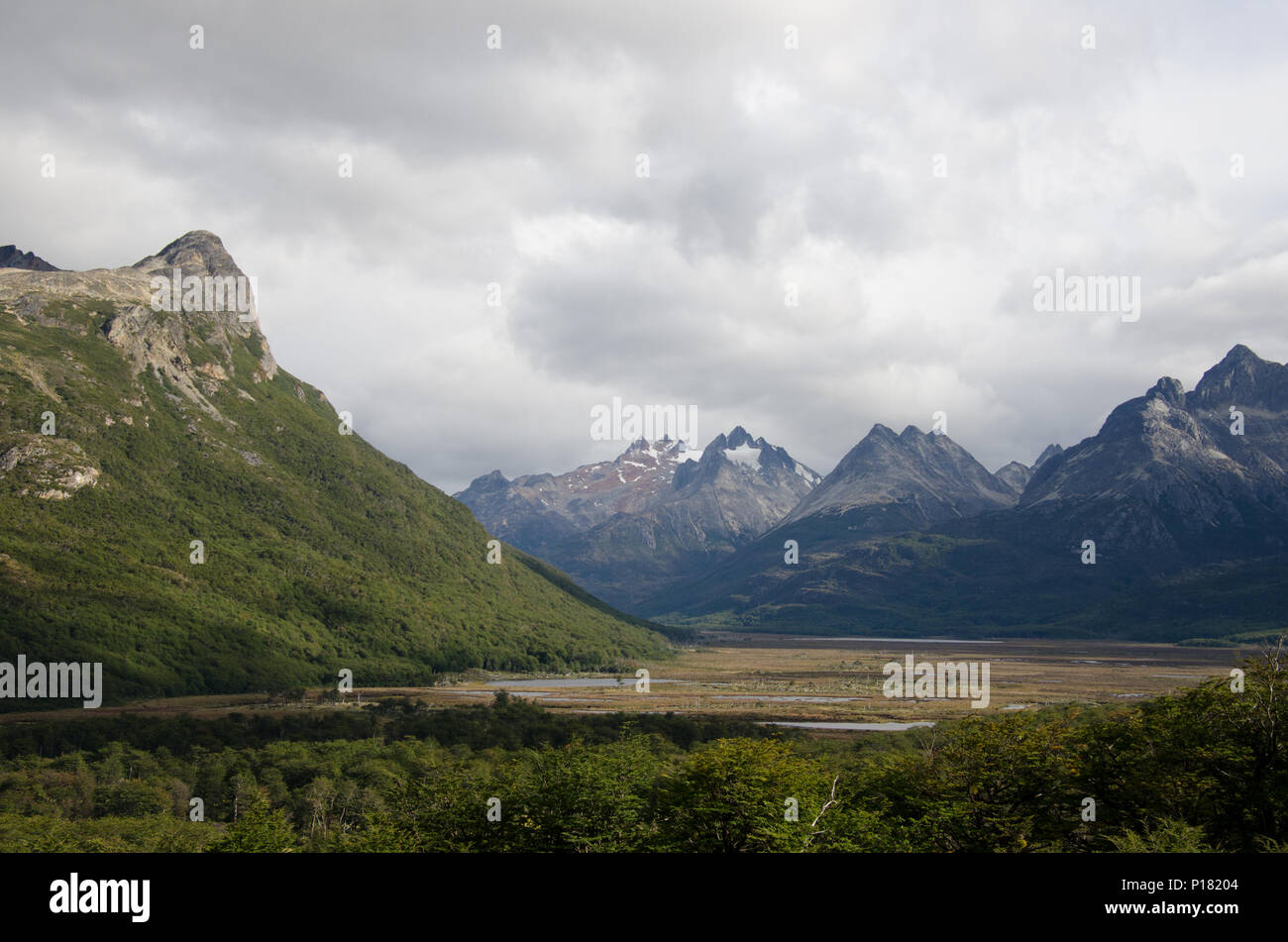 Remote mountain valley in Andes mountain range on cloudy day. Dreamy of