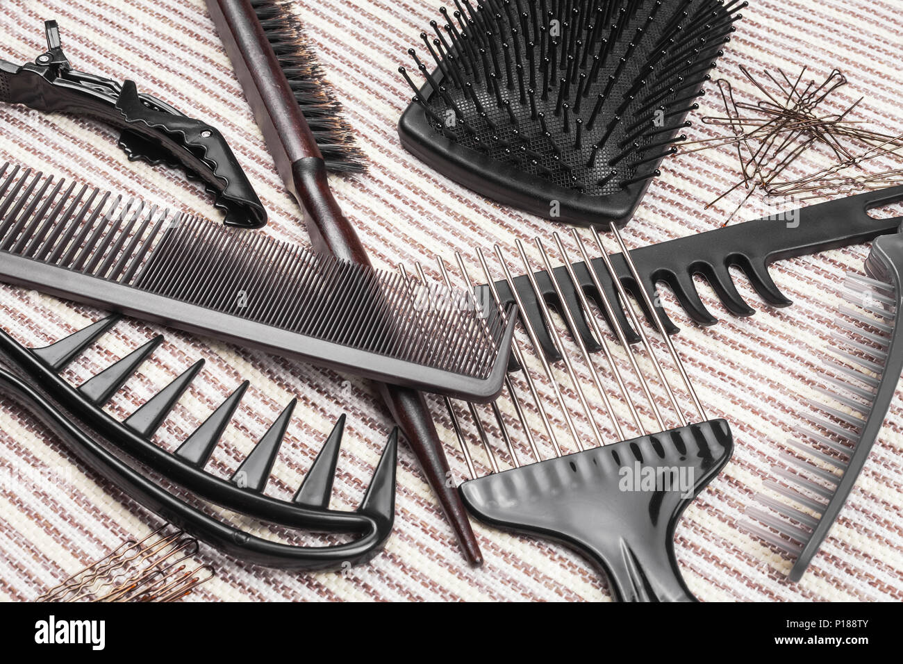Variety Of Different Hairbrushes Bobby Pins And Hair Sticks Stock