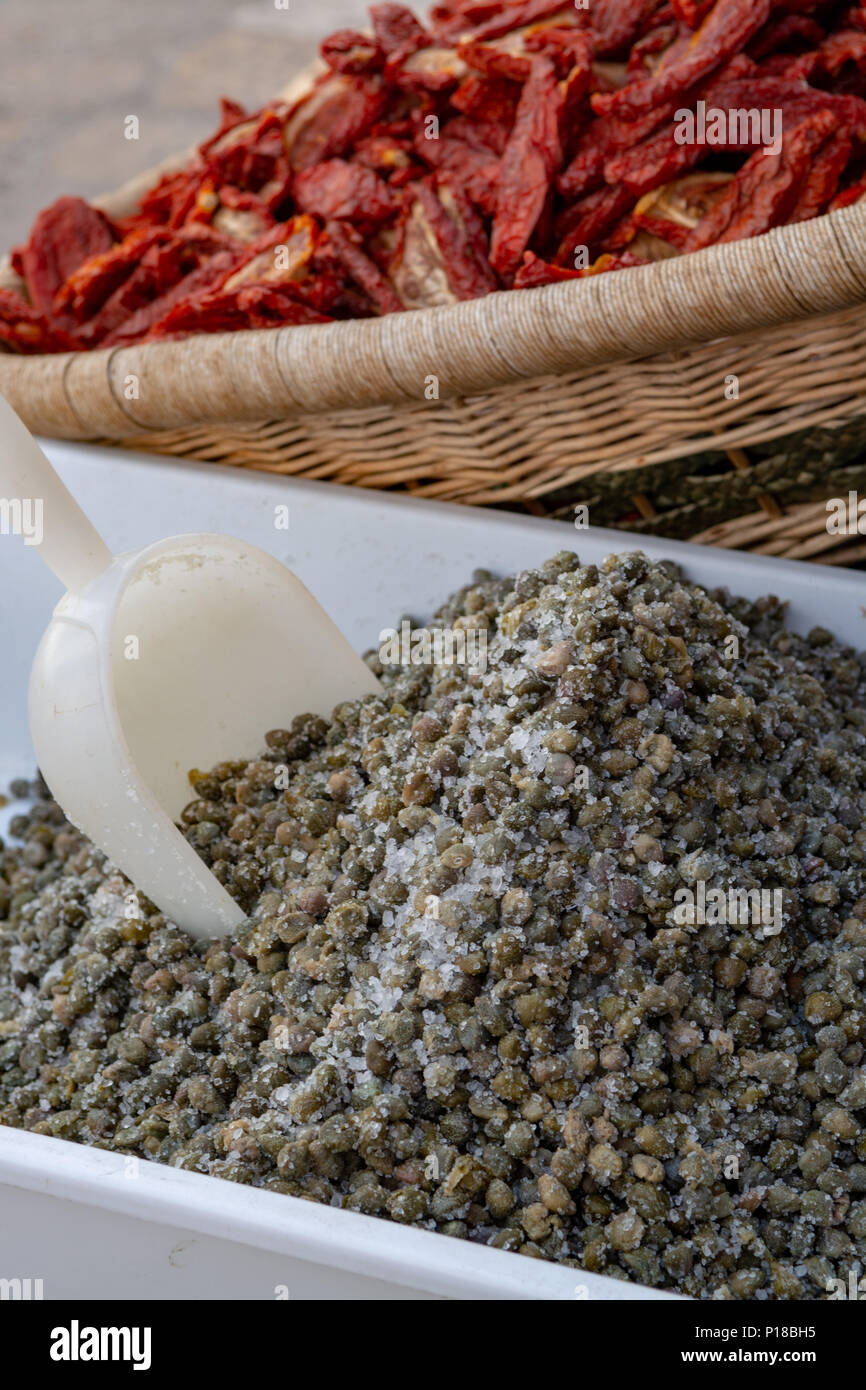 Important ingredient in traditional Italian cuisine, salted capers