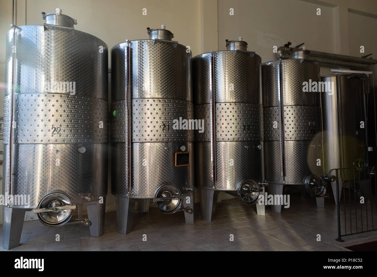 Modern bio wine production factory in Italy, inox steel tanks used for
