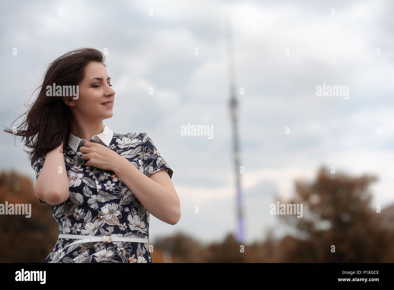 Beautiful girl for a walk in autumn on the nature Stock Photo - Alamy