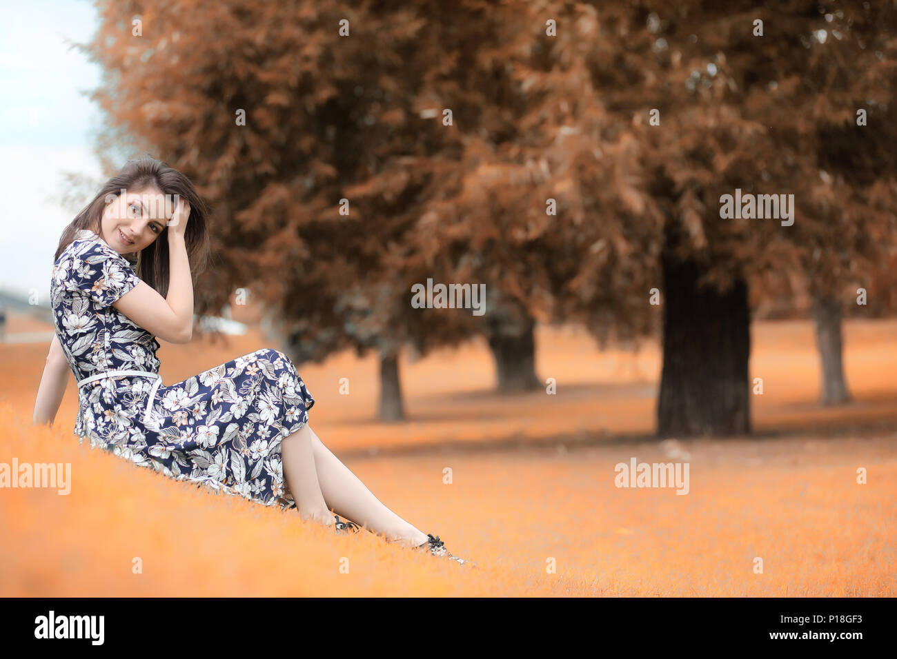 Beautiful girl for a walk in autumn on the nature Stock Photo - Alamy