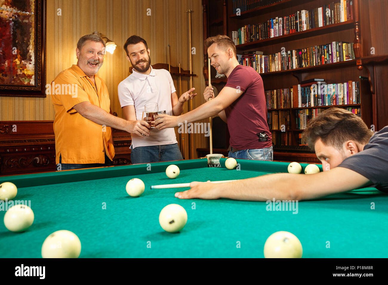 Group Young Cheerful Friends Playing Billiards Funny Time Work Stock Photo  by ©Romaset 316360520