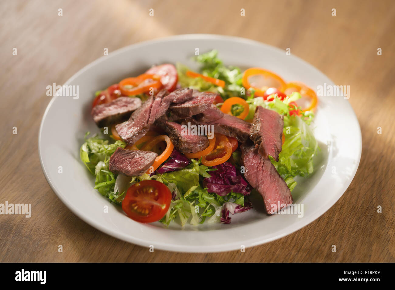 salad with sliced filet mignon steak Stock Photo