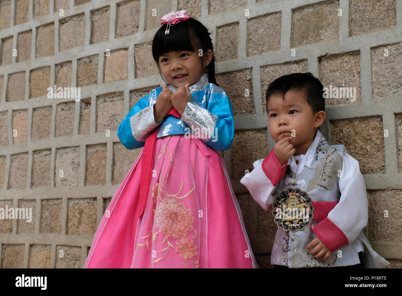 Young Korean Children In Traditional Costumes At Gyeongbokgung Or