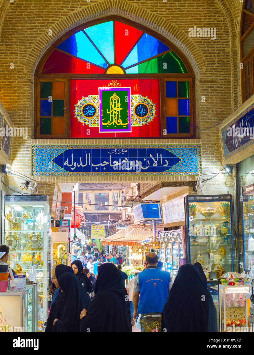 TEHRAN, IRAN - MAY 22, 2107: People at Tehran Grand Bazaar. The Grand Bazaar is an old historical market in Tehran. Stock Photo