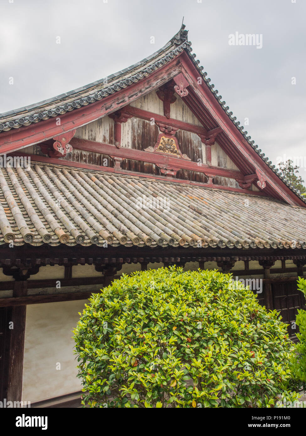Hondo main worship hall,tile roof,  Taisanji temple 52,  Shikoku 88 Temple  pilgrimage,  Ehime, Japan. Stock Photo