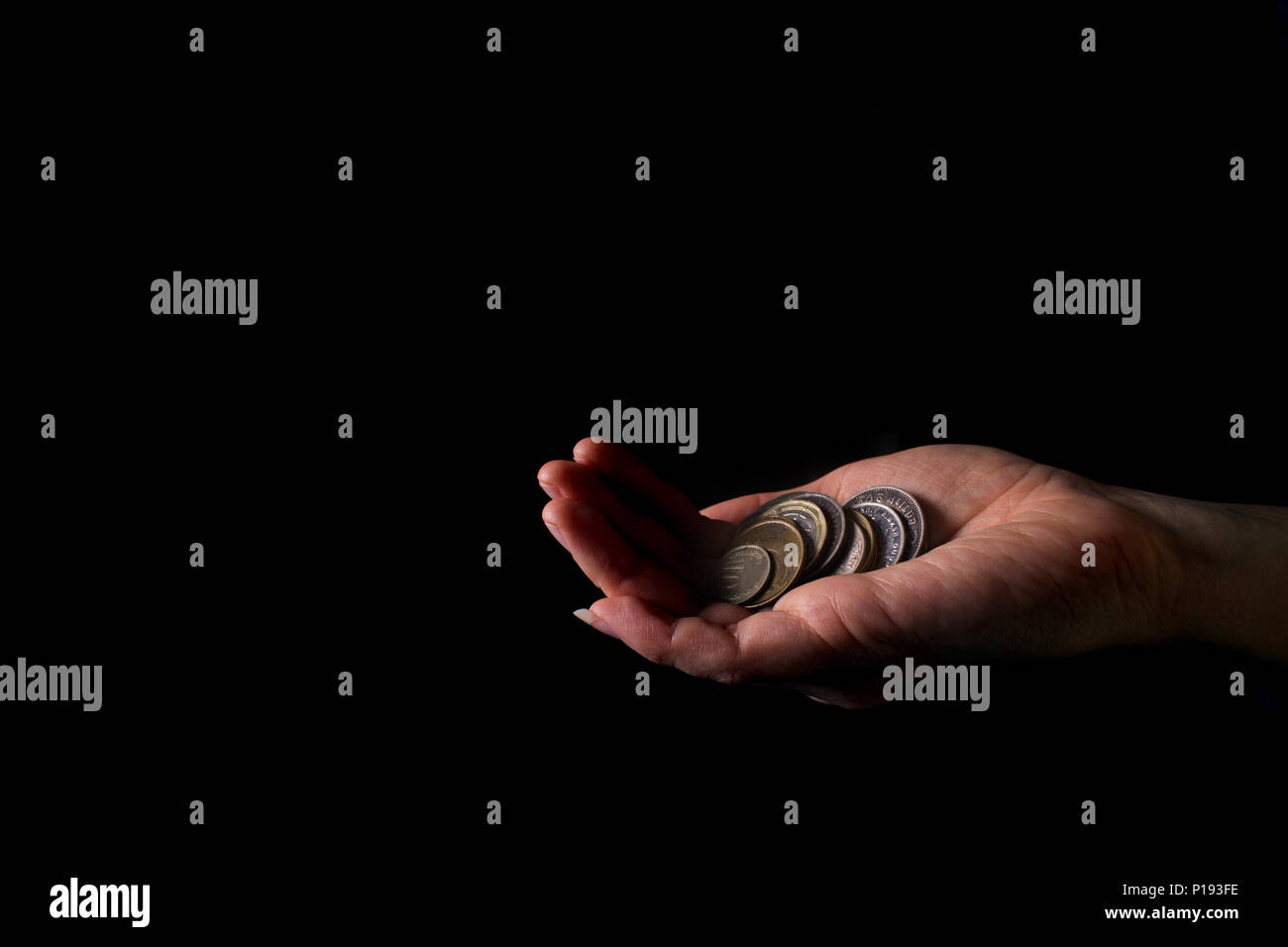 beg for money concept. beggar on black background Stock Photo - Alamy