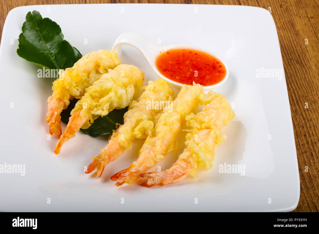Tiger prawn tempura with green sauce on wood backgrond Stock Photo Alamy