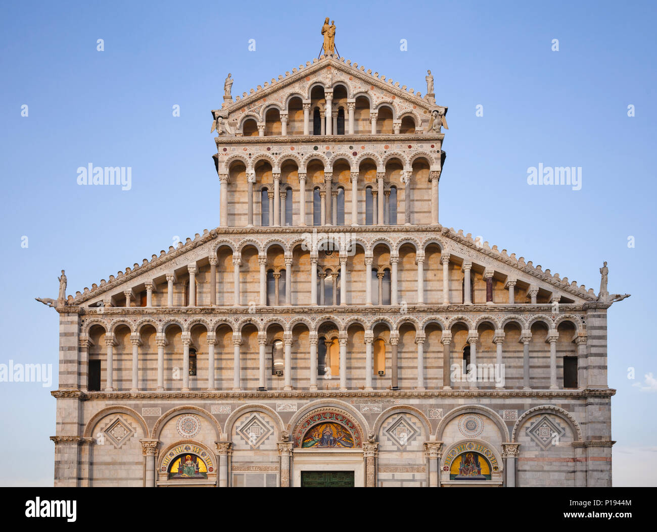 Pisan Romanesque facade of medieval Roman Catholic Pisa Cathedral at Piazza dei Miracoli (Piazza del Duomo), an important center of European medieval  Stock Photo