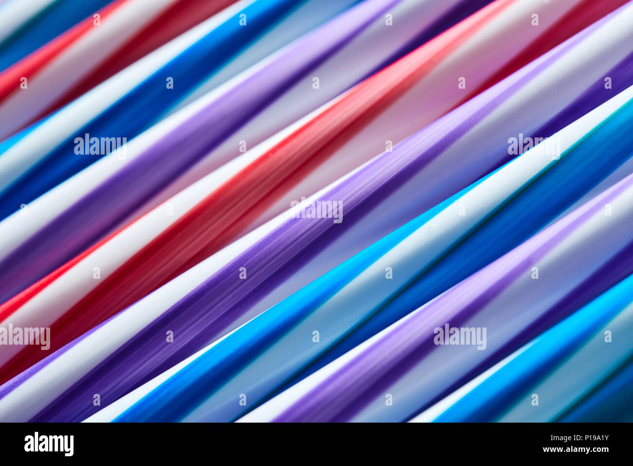Drinking straws colorful coming together. Stock Photo