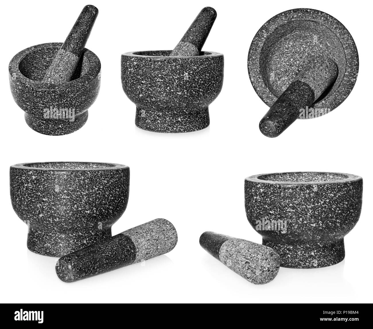 Granite mortar with pestle. Empty crushing dish, isolated on a white background. Stock Photo