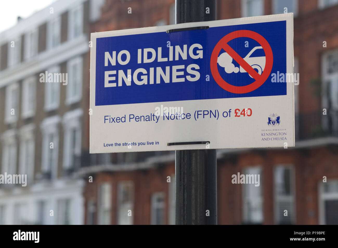 public warning notice, no idling of engines on this street Stock Photo