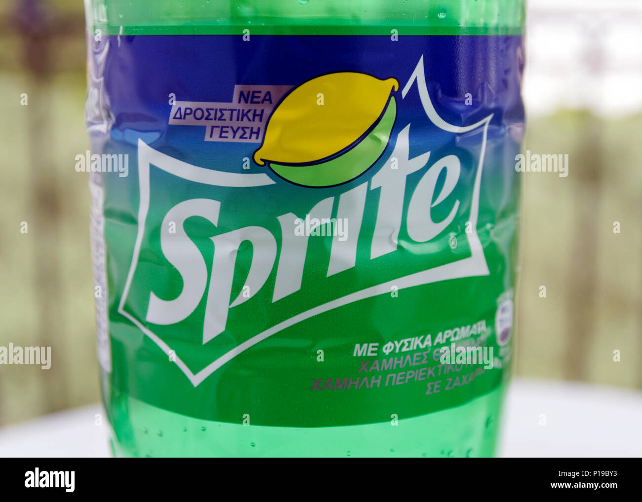 Bottle of Sprite with label in Greek. Stock Photo