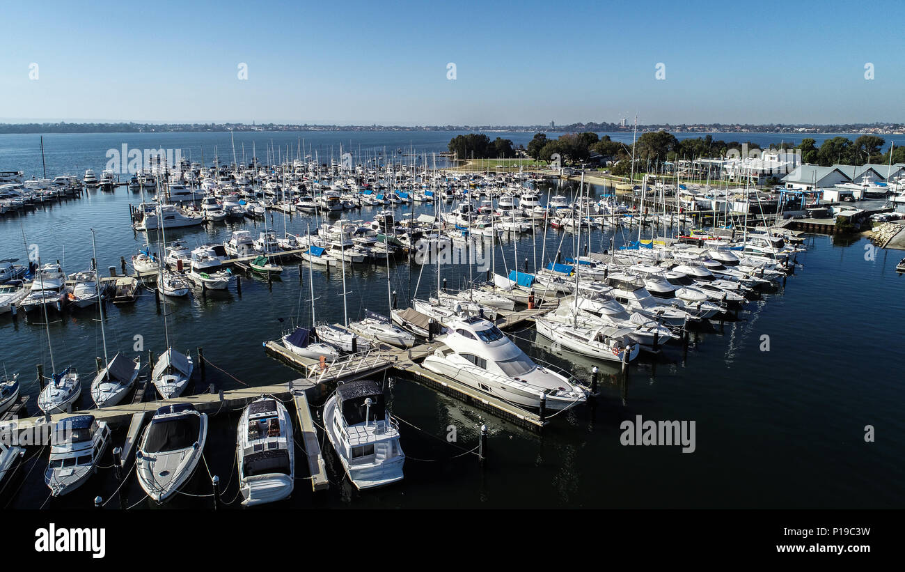 Boating marina with many yachts and speedboats on Swan River in Perth