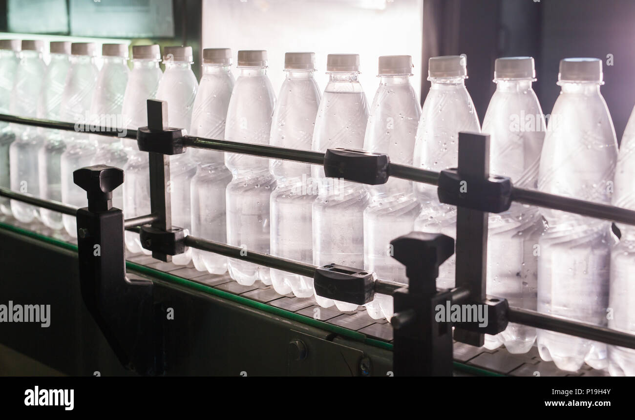 Closeup on mineral water bottles in raw and lines Stock Photo Alamy