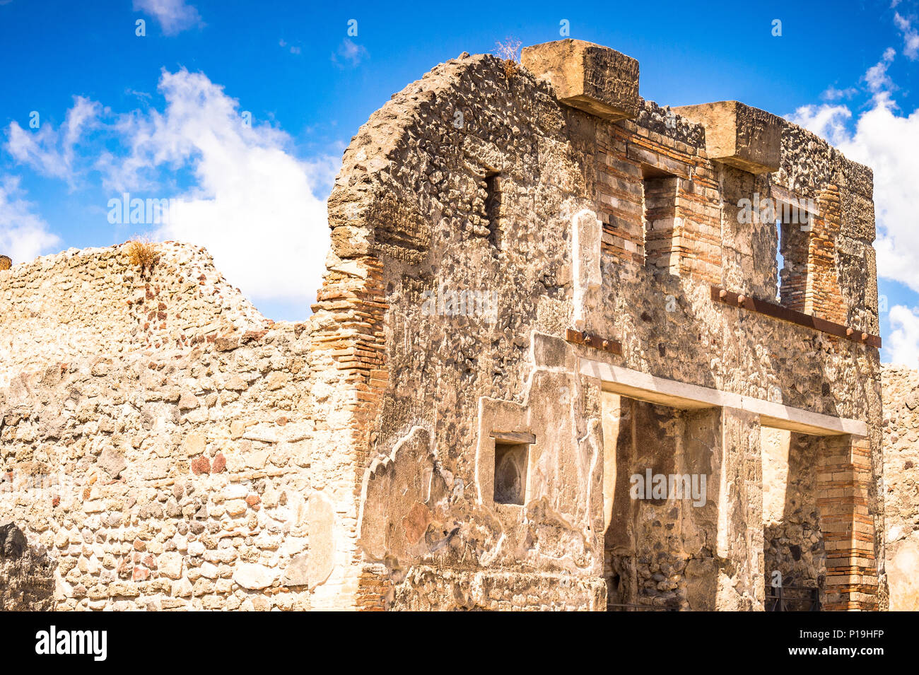 Pompeii was an ancient Roman city near modern Naples was buried under volcanic ash and pumice in the eruption of Mount Vesuvius in AD 79. Stock Photo