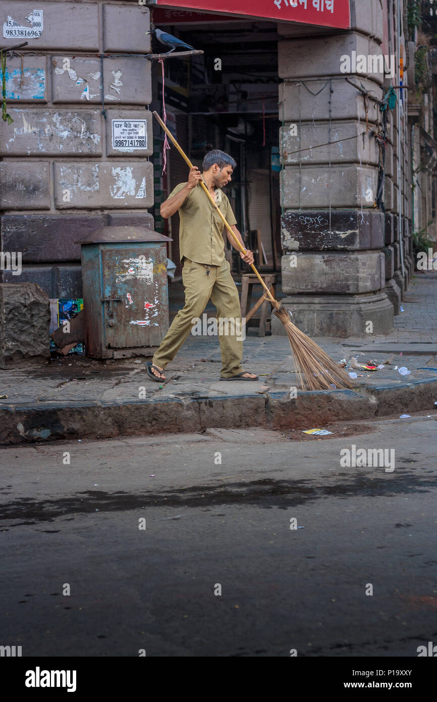 Indian road sweeper hires stock photography and images Alamy