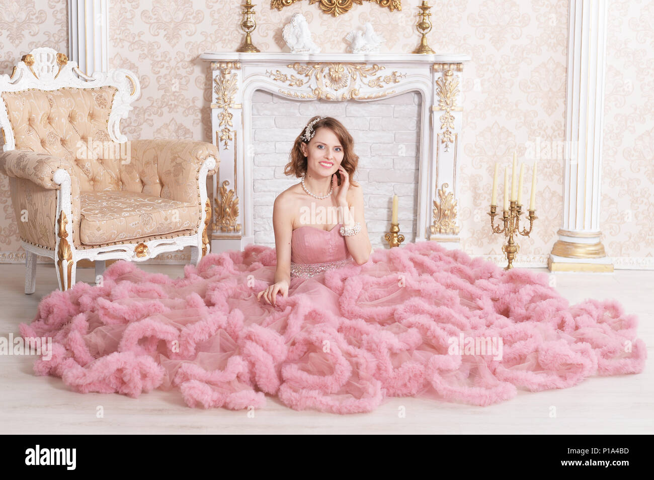 beautiful young woman in pink dress Stock Photo - Alamy