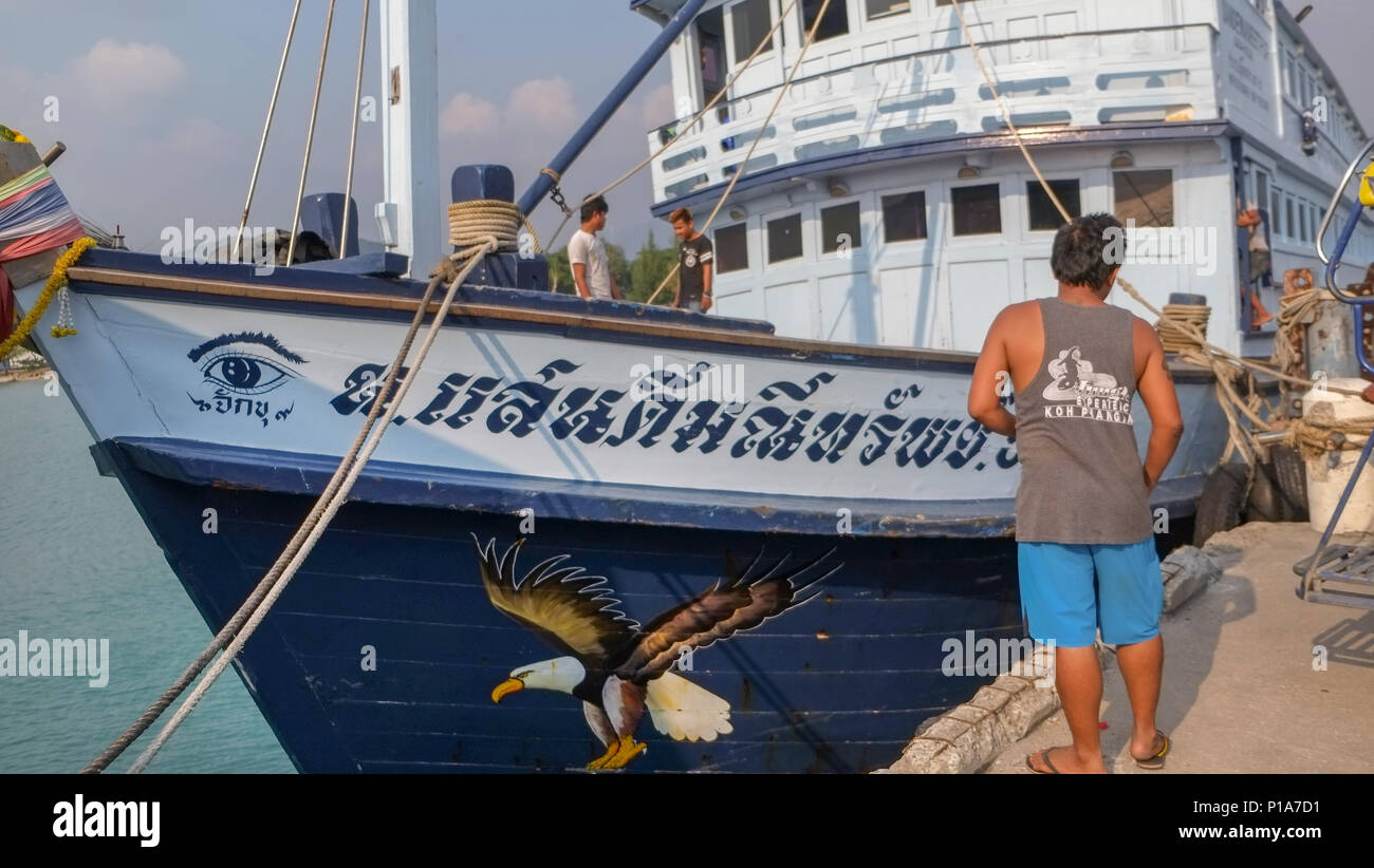 Maintenance of a ferry at a port in Ko Pha-ngan, Thailand Stock Photo