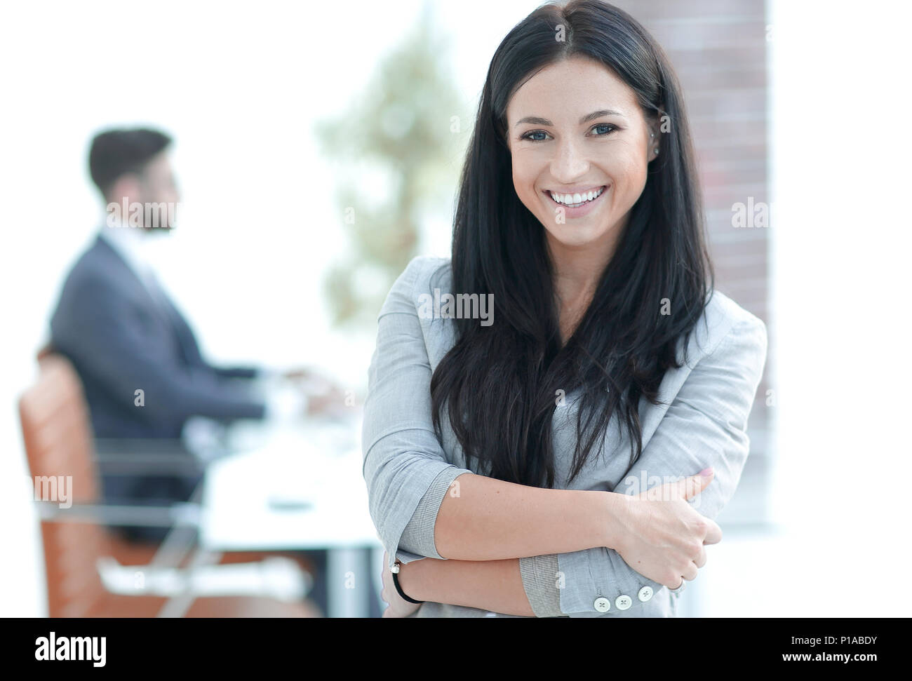 successful young business woman on the office background Stock Photo ...