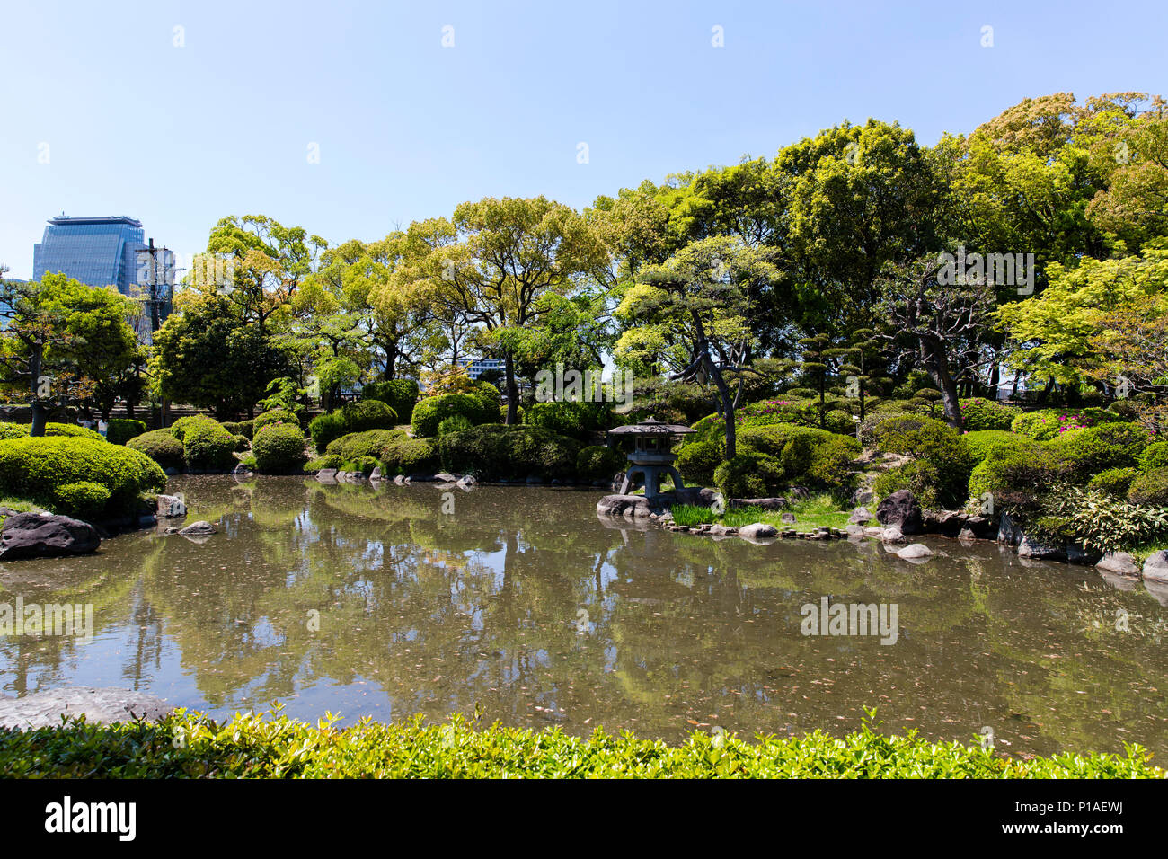 Japanese Garden and Pond inside the grounds of Osaka Castle Stock Photo