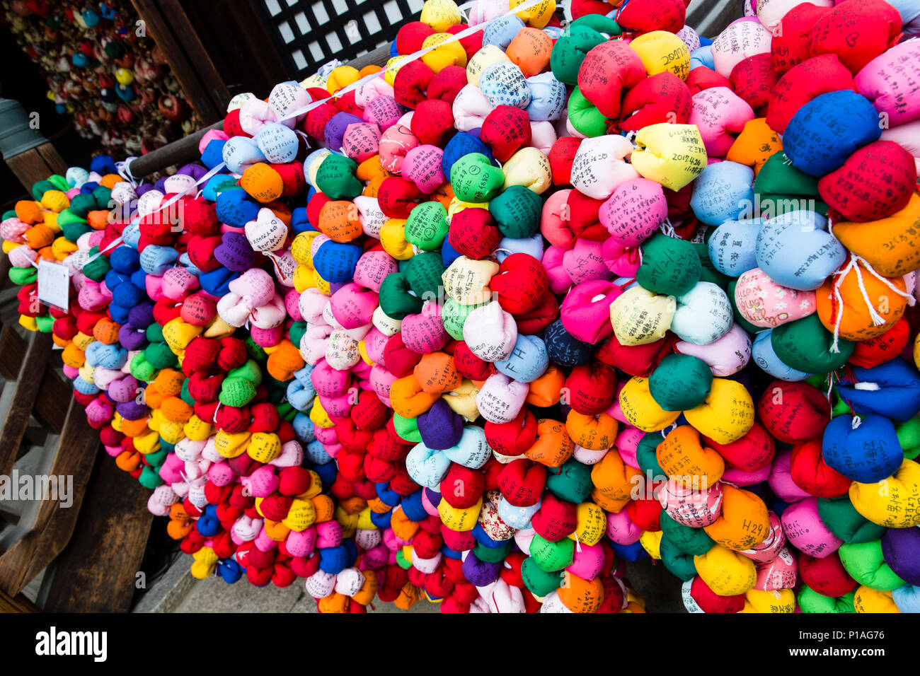 Close-up detail of Coloured Balls used instead of Wooden Ema at the Yasaka Koshindo Shrine, Kyoto, Japan. Stock Photo
