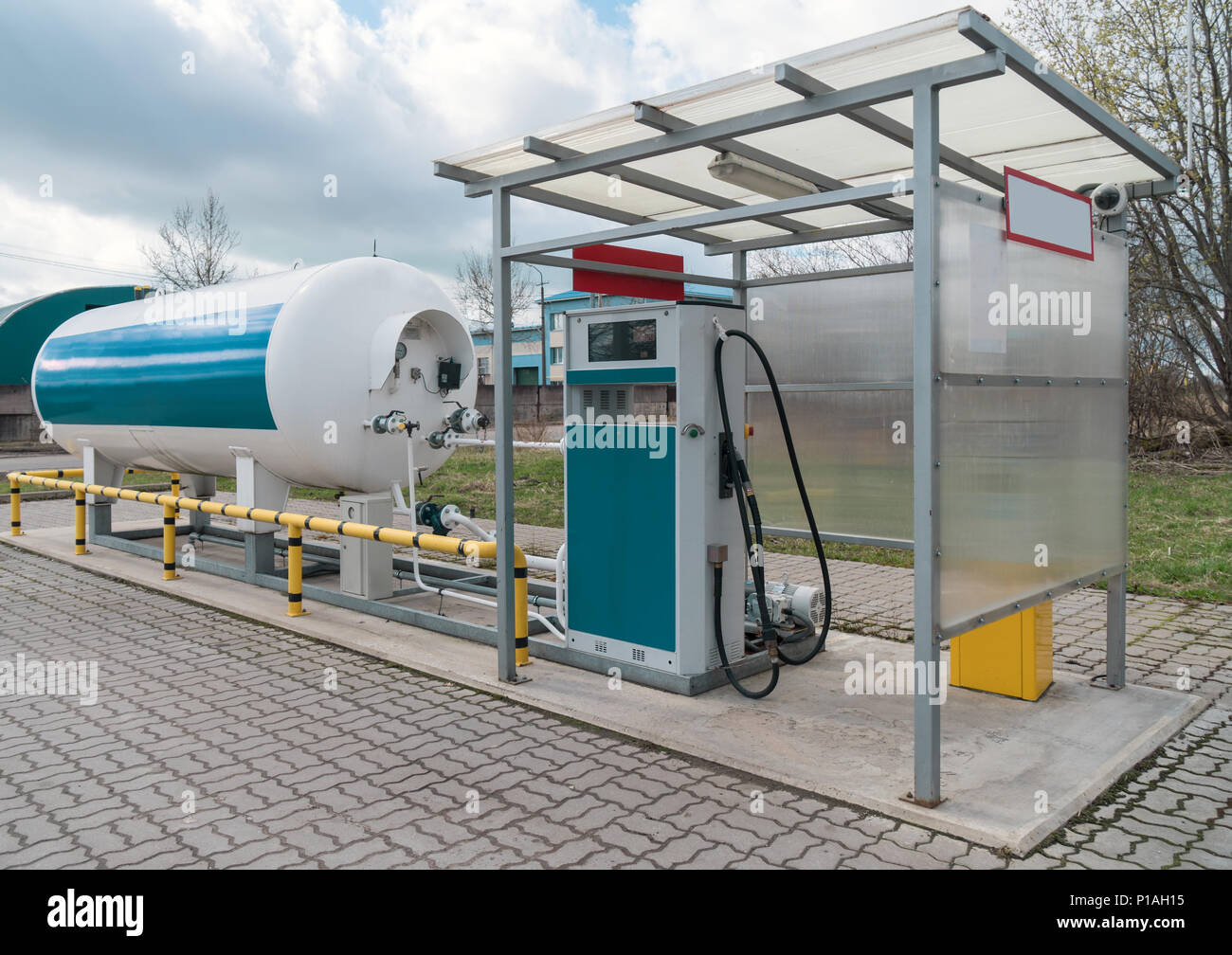LPG gas station with white tank. Stock Photo