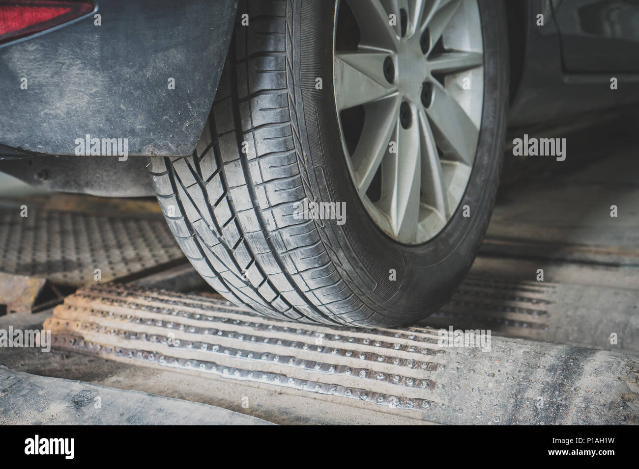 Wheel alignment and balancing in auto service. Stock Photo