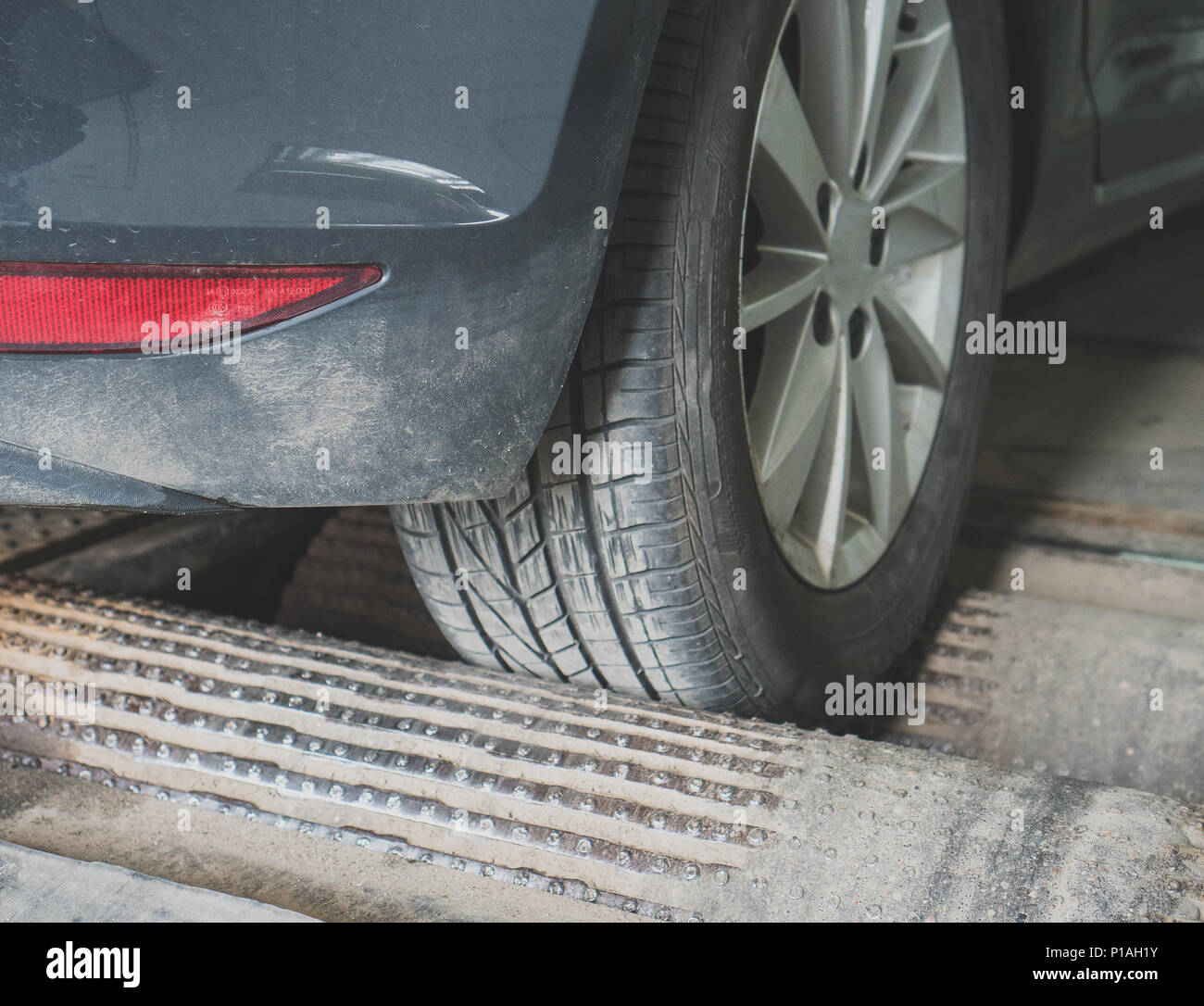 Wheel alignment and balancing in auto service. Stock Photo