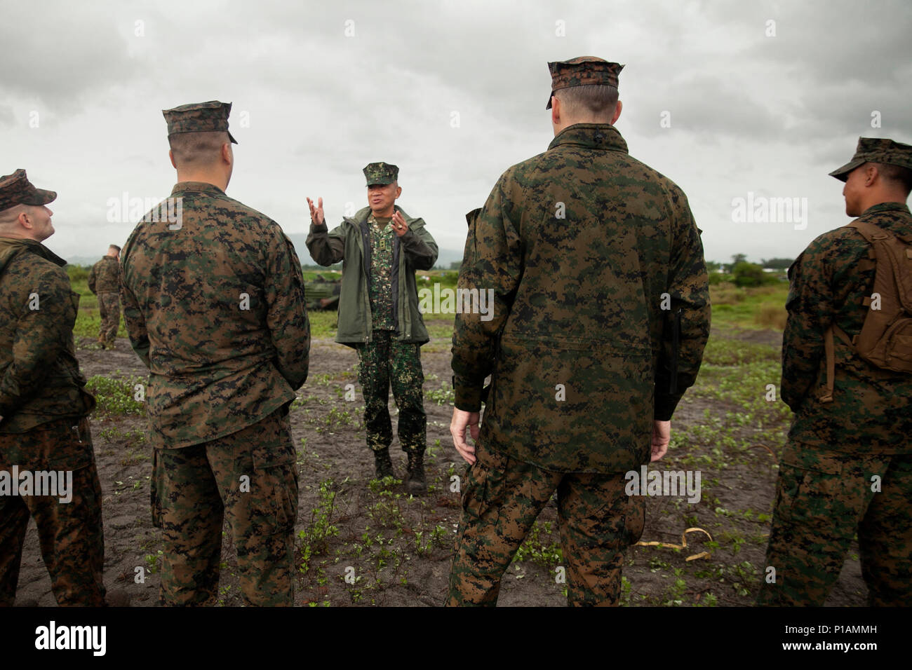 Philippine Marine Maj. Gen. Andre Costales discusses the D-Day forcible  entry operations on Subic Bay, Philippines, with U.S. Marines during  Philippine Amphibious Landing Exercise 33 (PHIBLEX), Oct. 7, 2016. PHIBLEX  is an