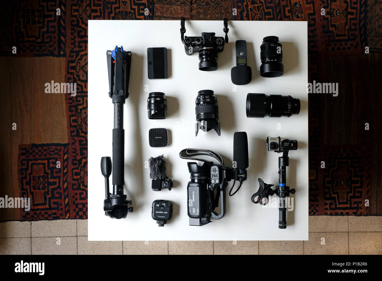 High Angle Shot Of Photography Cameras And Accessories Stock Photo