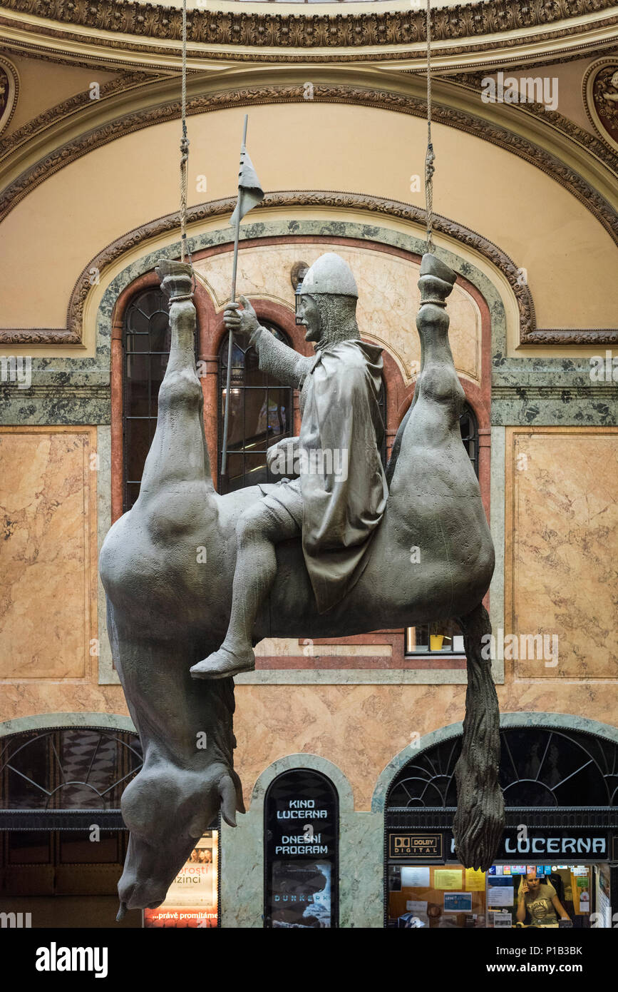 Prague. Czech Republic. Kun (Horse), 1999, Sculpture of King Wenceslas by sculptor David Černý hanging in the 1920's Lucerna Palace shopping arcade. ( Stock Photo