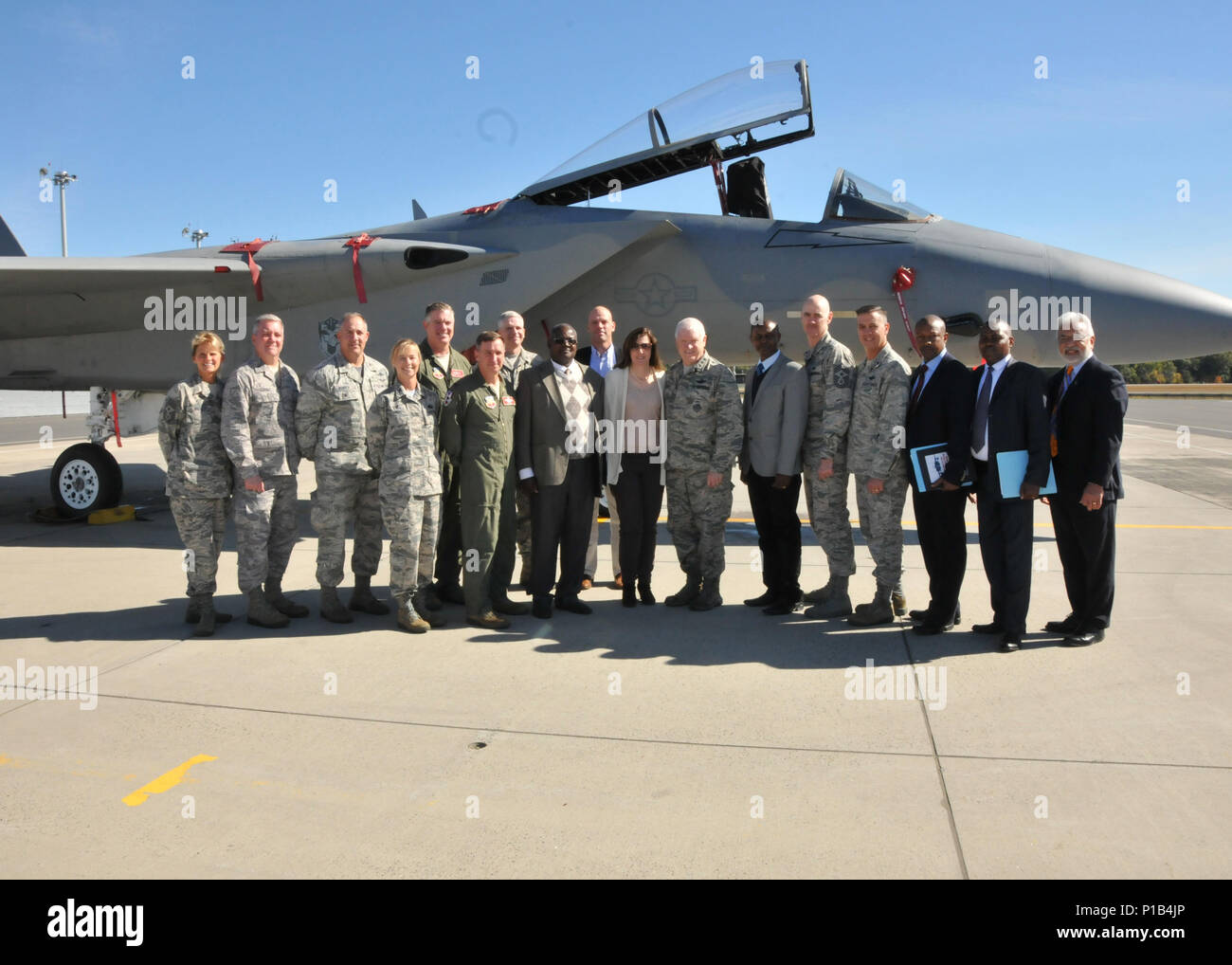 Leaders from the Kenyan Air Force Kenya Lt. Gen L. Scott Rice Director of the Air National Guard DANG and leadership from the 104th Fighter Wing stand for a photo in front