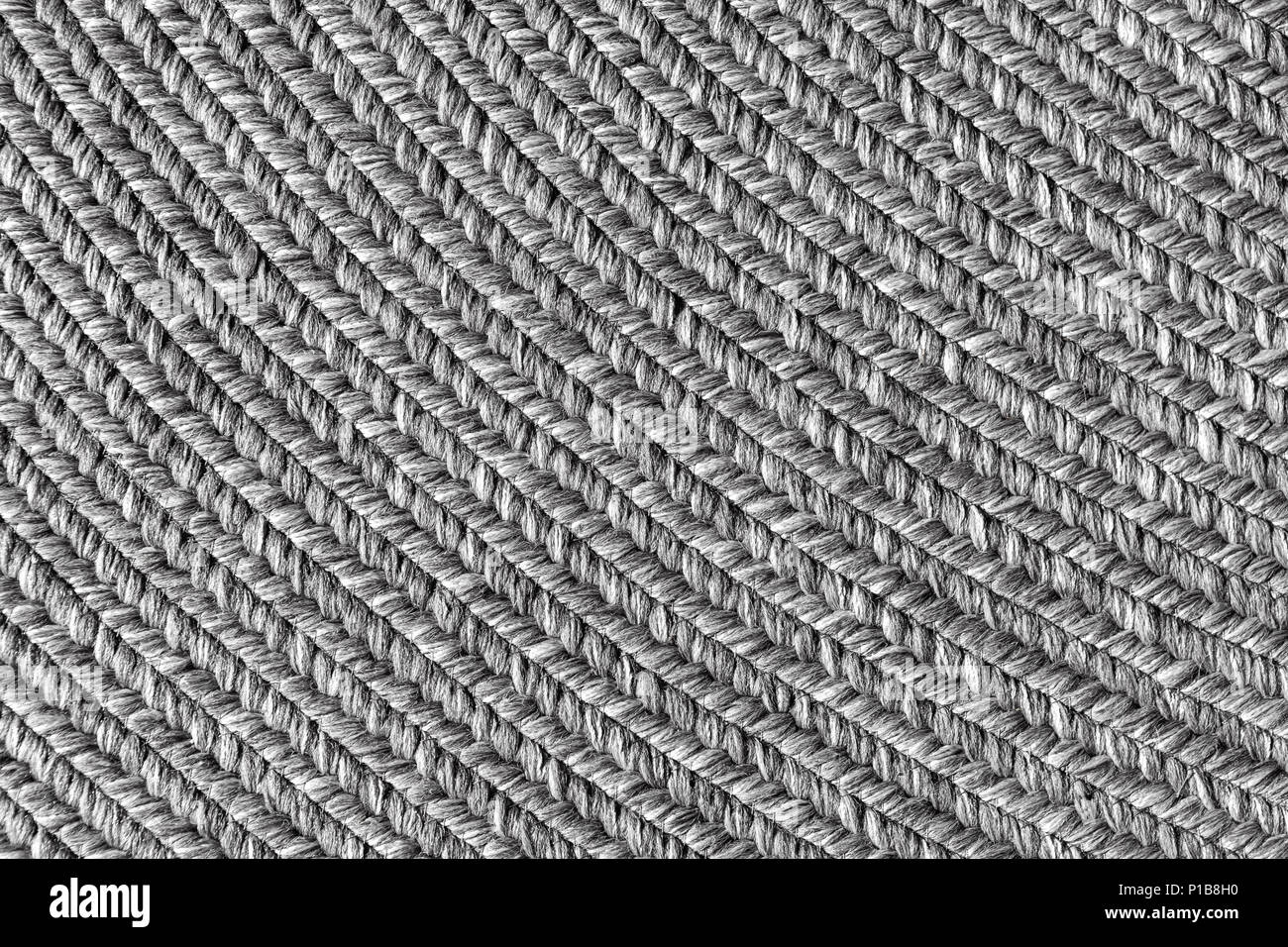 Jute braided home spiral rug background texture pattern closeup