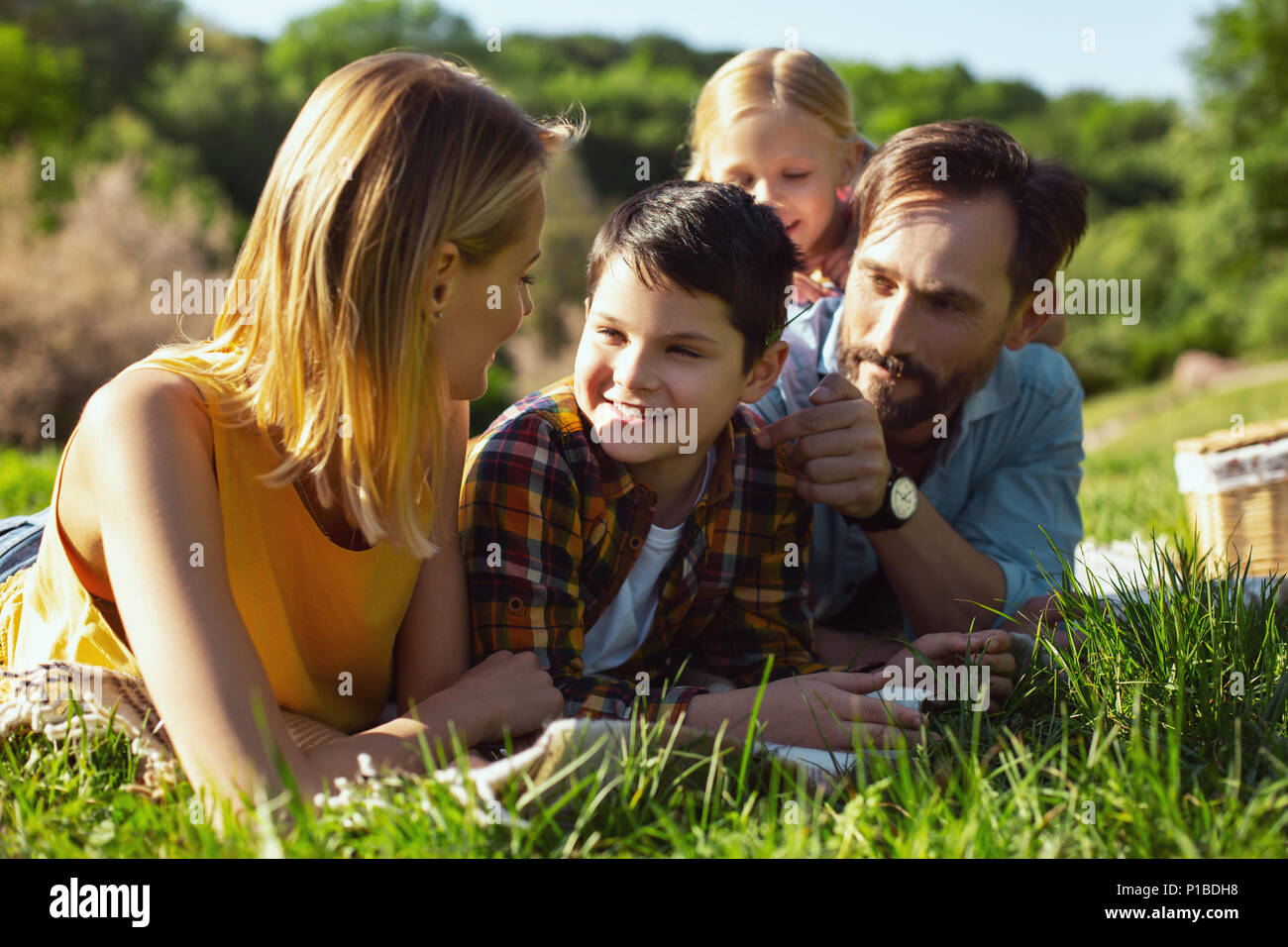 Family relaxing together in hi-res stock photography and images - Alamy