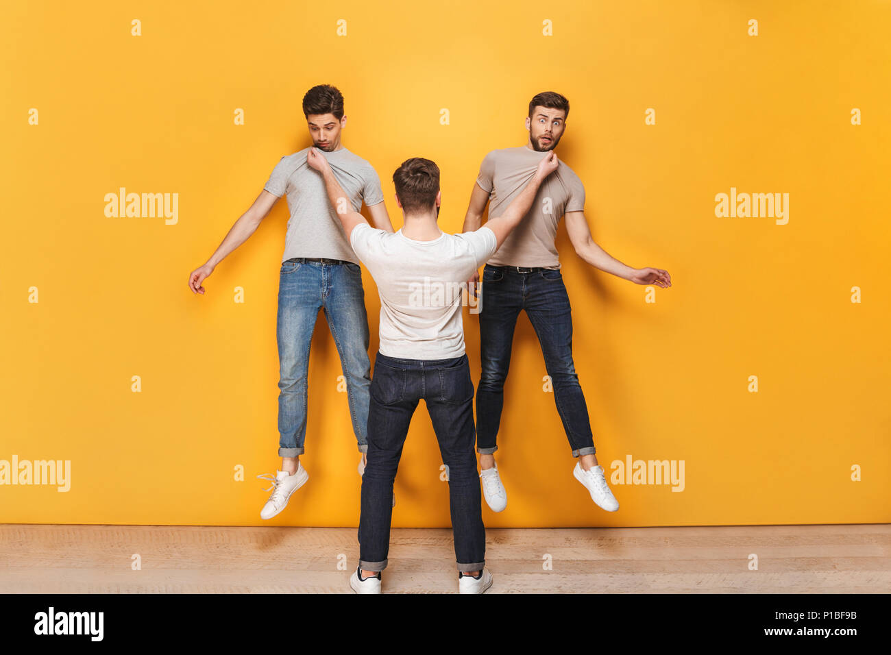 Grabbing collar hi-res stock photography and images - Alamy