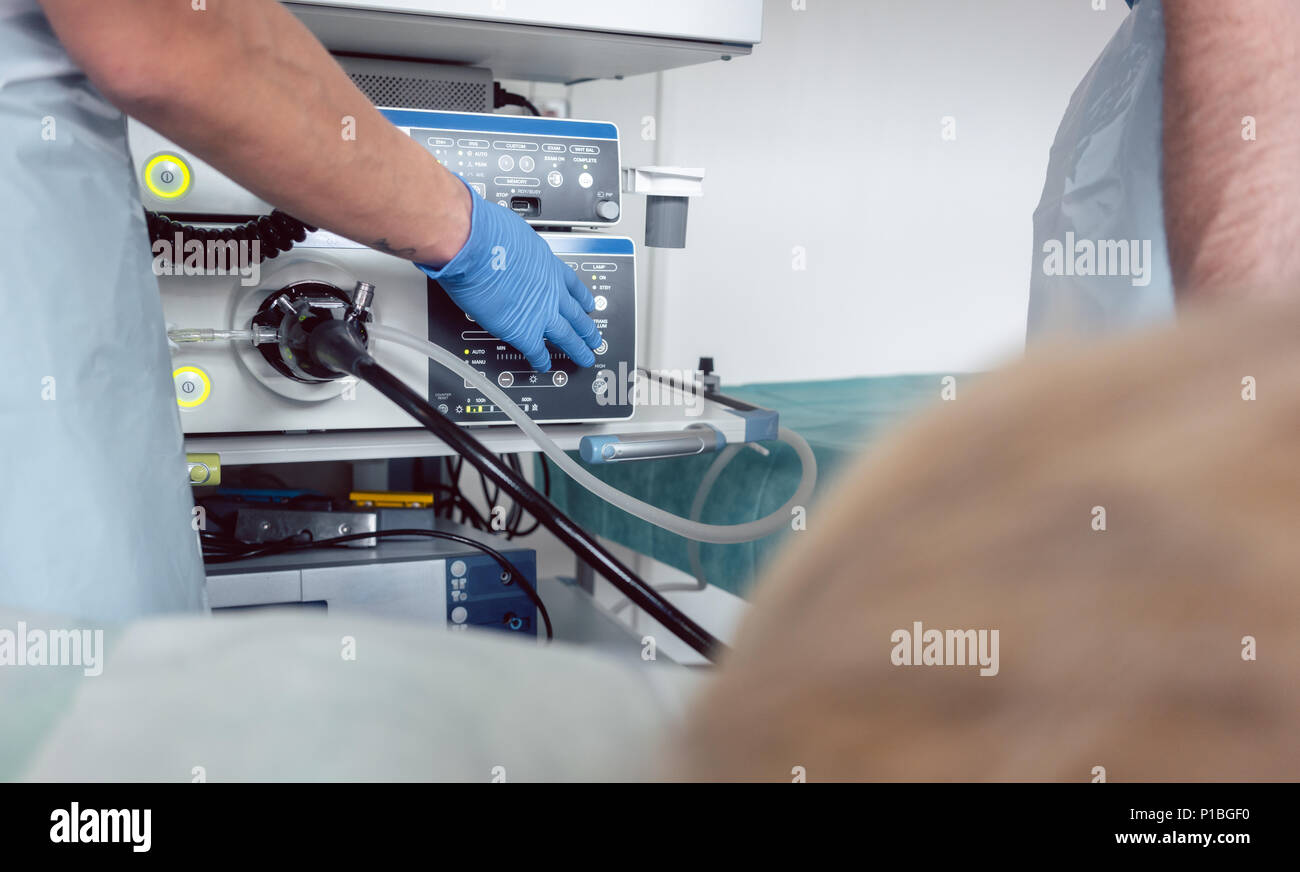 Doctor inserting camera of endoscope during gastroscopy Stock Photo Alamy