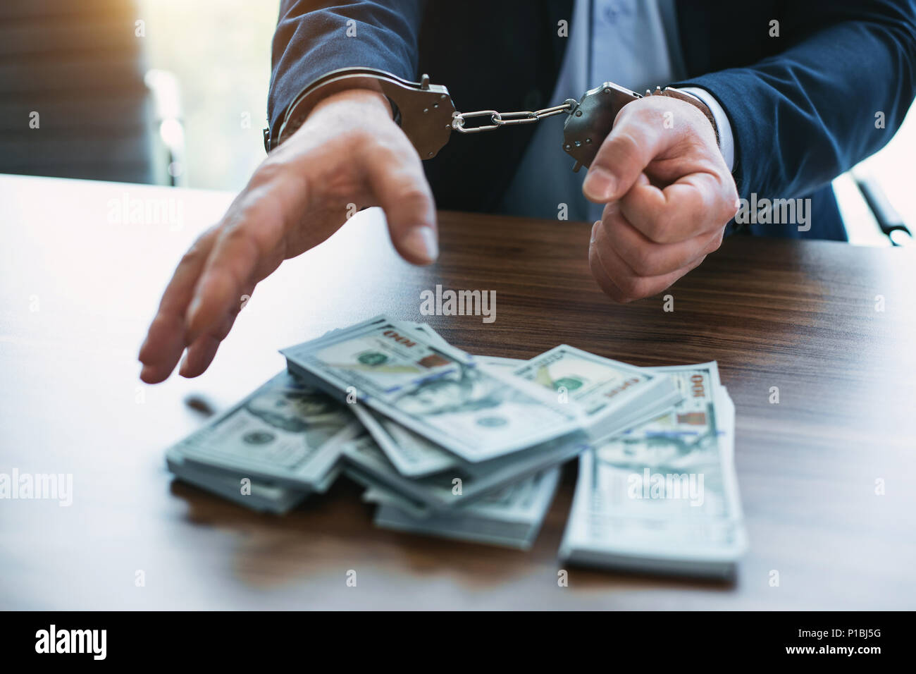 Well-known official accused of bribery Stock Photo