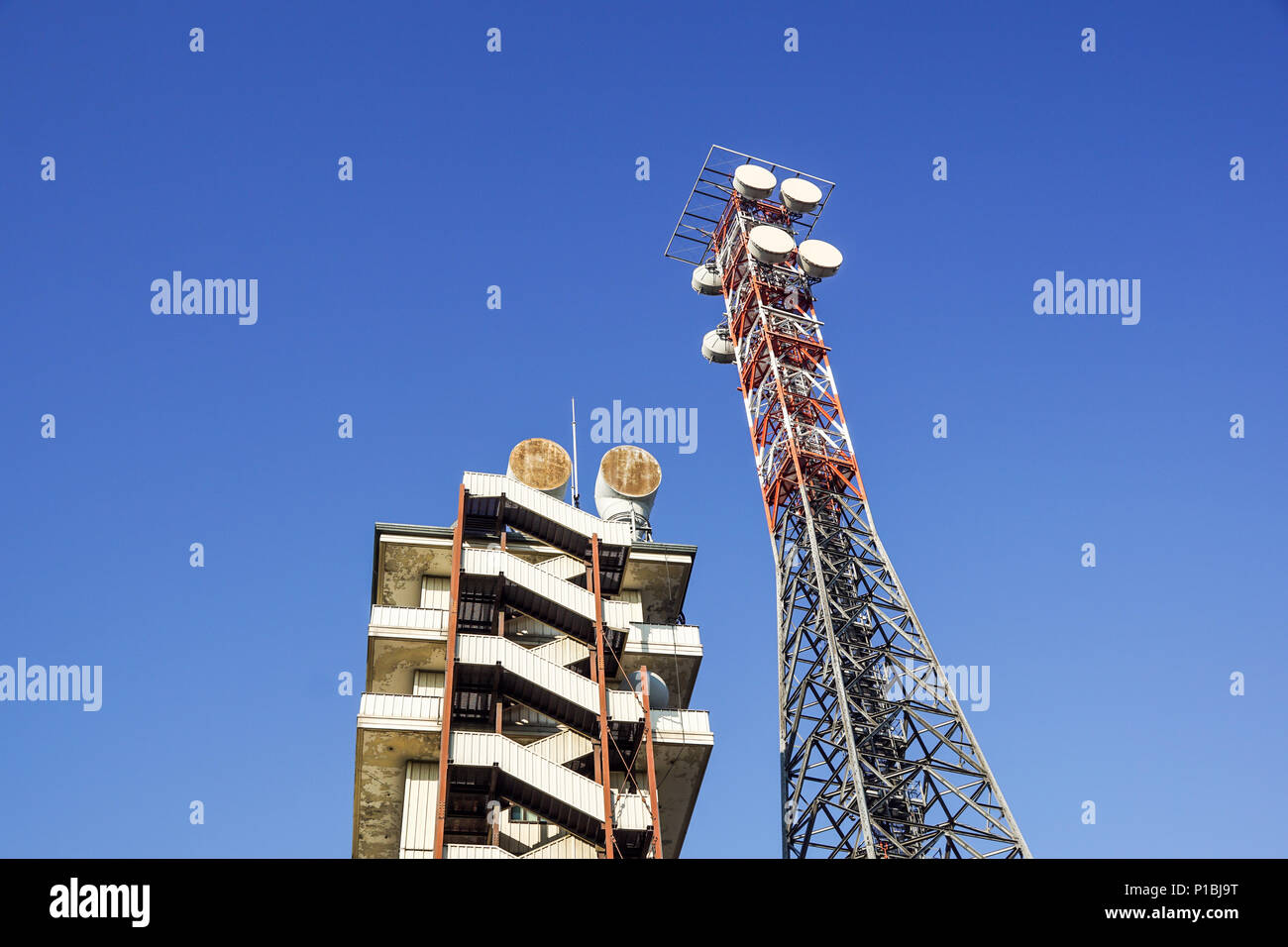 telecommunication tower with the blue sky. Cell Phone Signal Tower, antennas Stock Photo